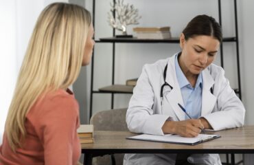 woman receiving well woman exam